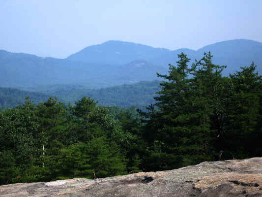 view_from_Rocky_Face_Mtn--Alexander_County_NC--to_Little_Mtn.-Bald_Rock_Mtn.-Pores_Knob--2006-06-21.jpg (152598 bytes)